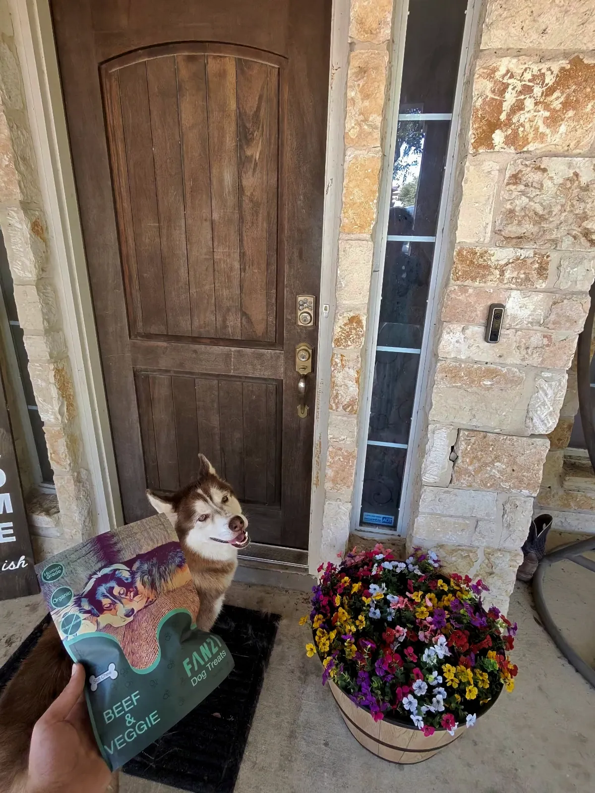 Bag of Fanzi treats delivered to a front door